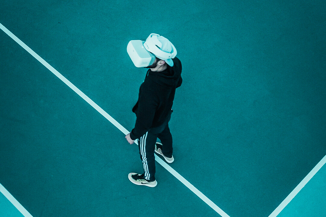 top view of a man in training outfit with VR headset