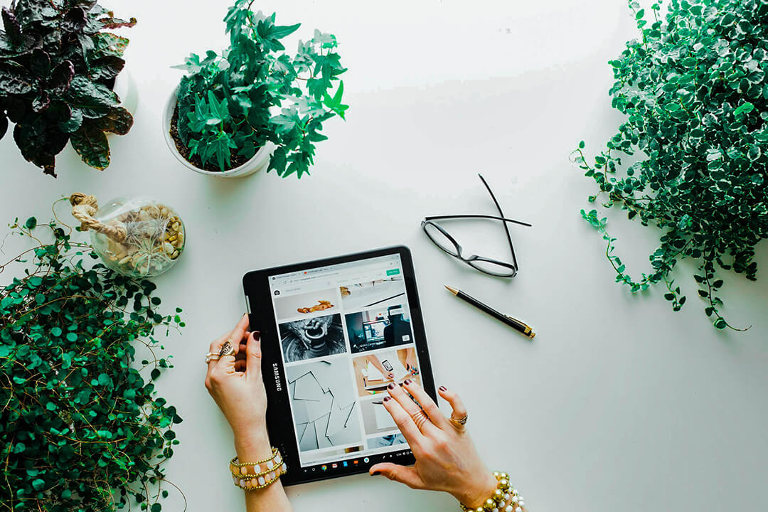 tablet being used to browse through social media